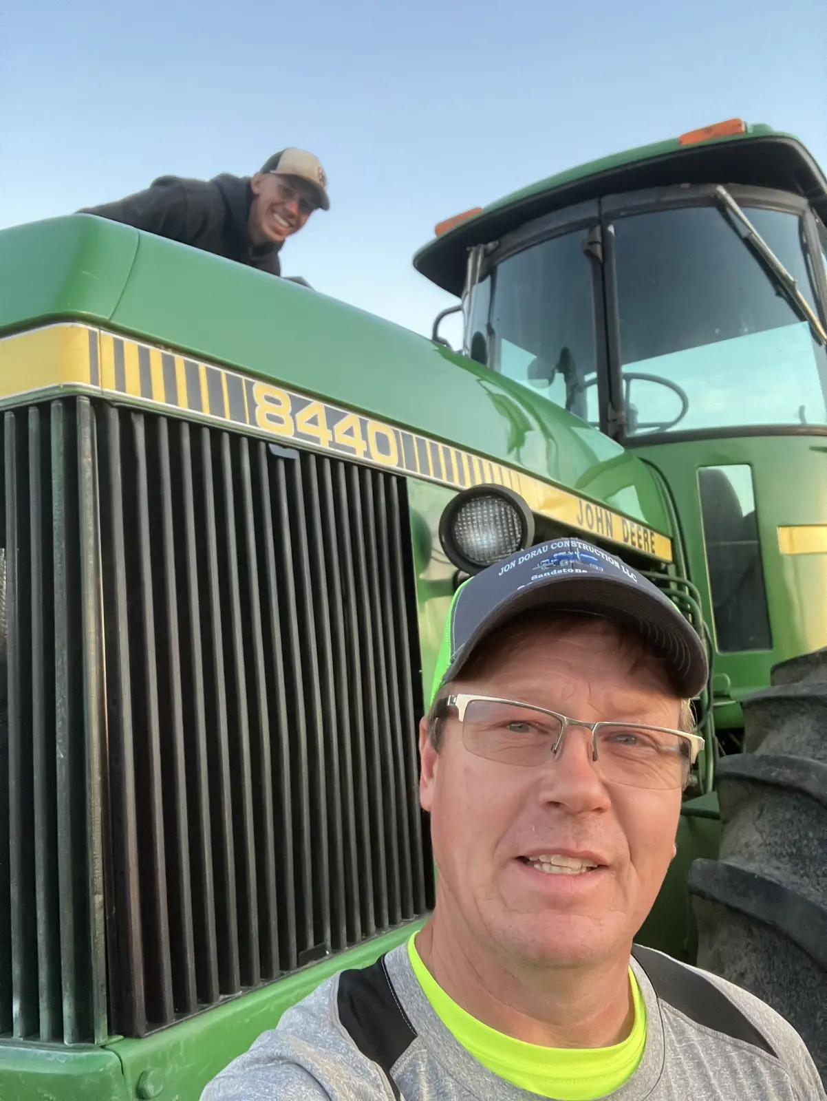 Jon Dorau beside a tractor