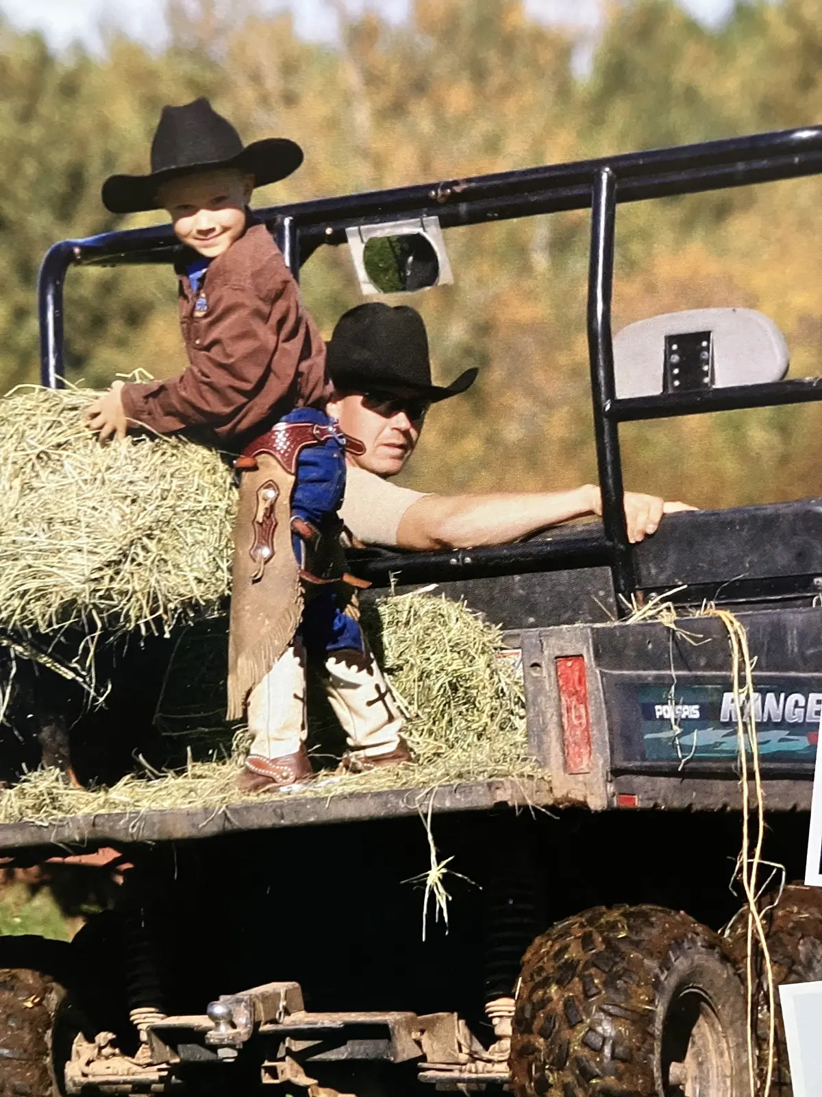 Jon Dorau helping children feed livestock